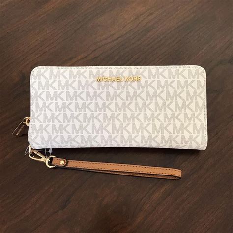 michael kors jet set pvc zip continental wallet|michael kors continental wristlet.